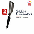 Two solid-brass 24V RGBW landscape lights included in the 2-light expansion pack