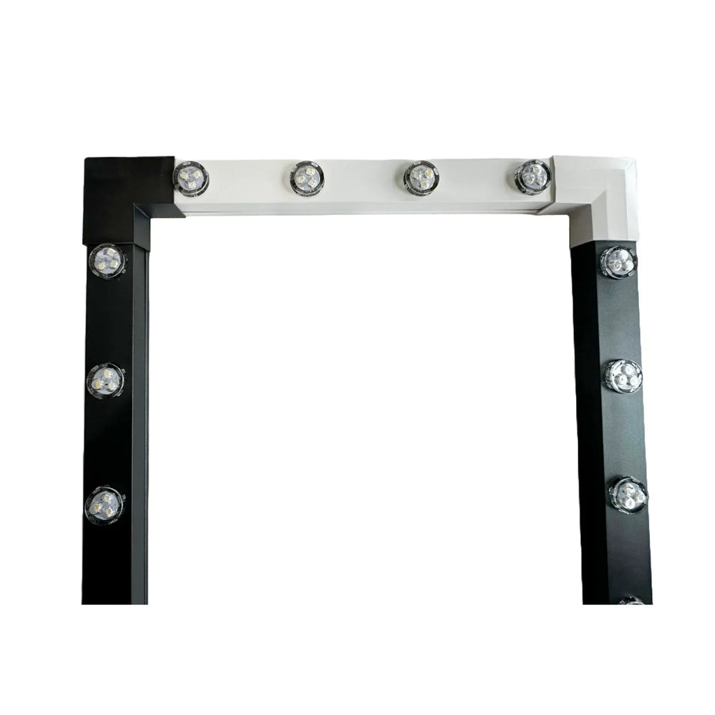 Black and white permanent LED track meeting at corner connectors around a 90-degree turn
