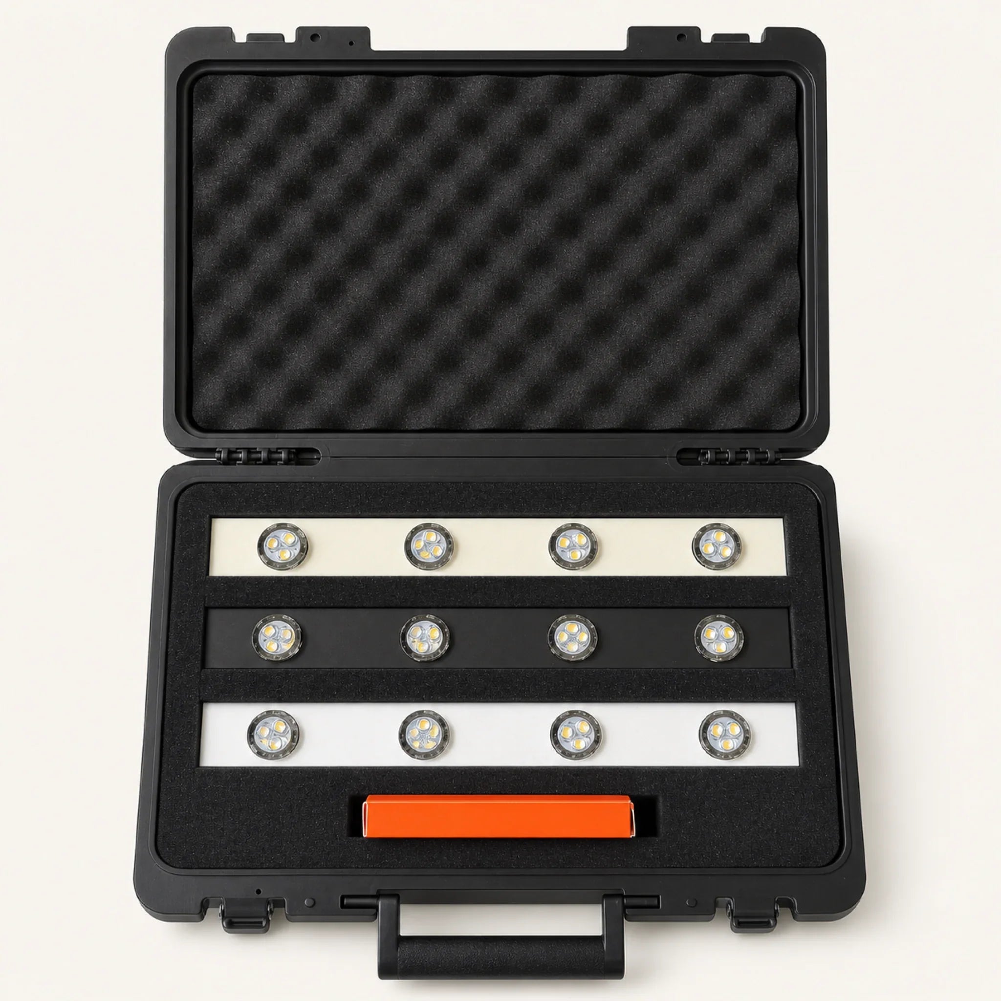 Open Bright Home Lights demo briefcase with twelve permanent LED puck lights on three track colors