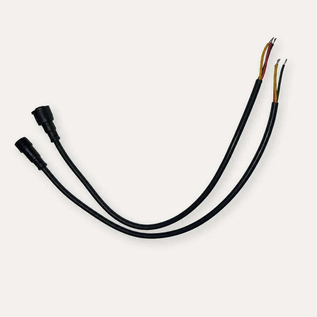 XConnect male and female pigtail pair with exposed red, yellow, and black three-wire leads