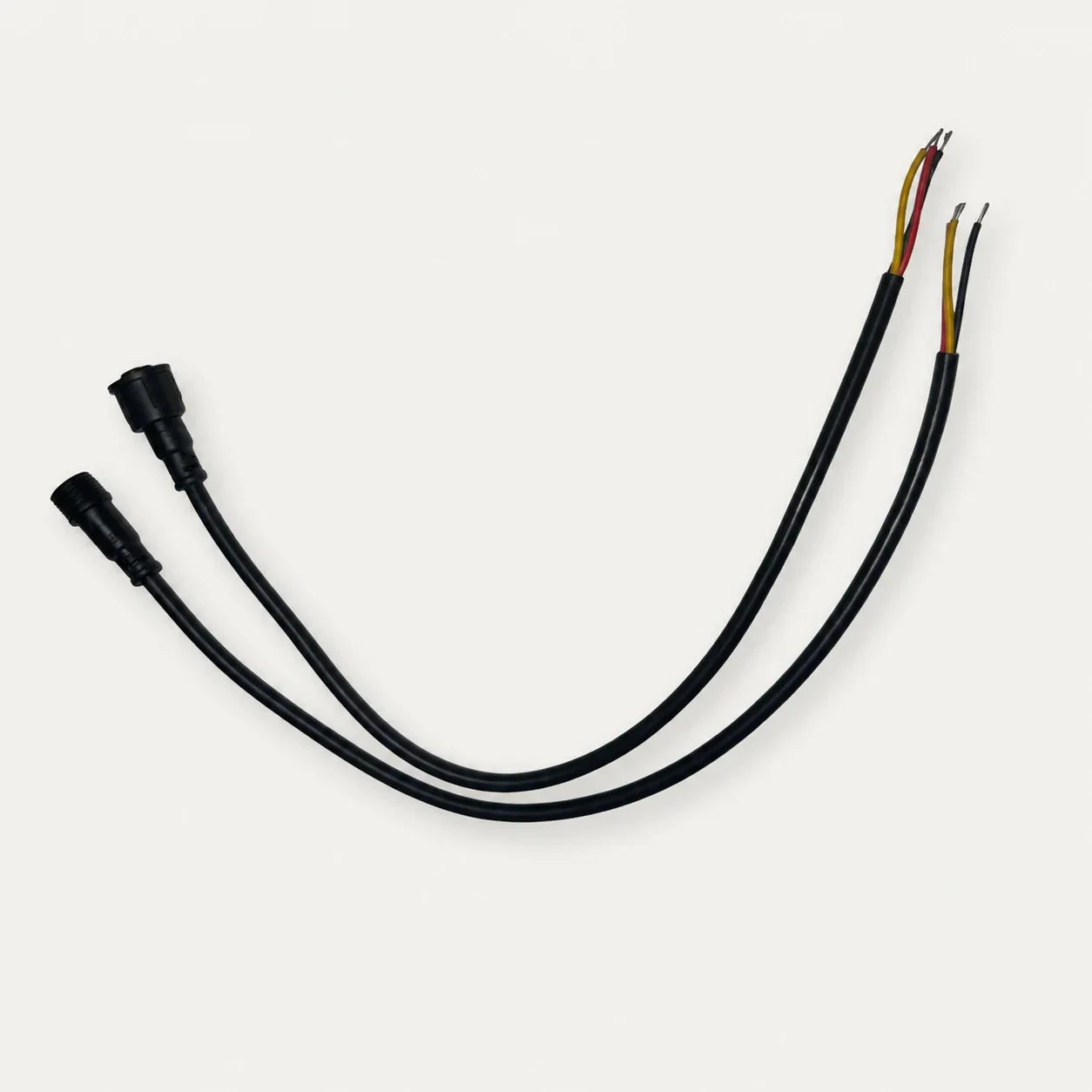 XConnect male and female pigtail pair with exposed red, yellow, and black three-wire leads