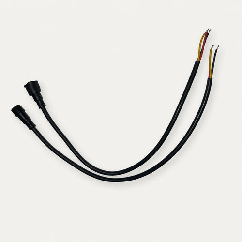 XConnect male and female pigtail pair with exposed red, yellow, and black three-wire leads
