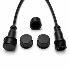 Five black waterproof XConnect caps for male 3-pin cable connectors shown with compatible plug ends